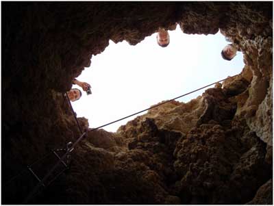 View from pit bottom with Heiko, Tobias and Stephan peering down (Photo N. Gassen)