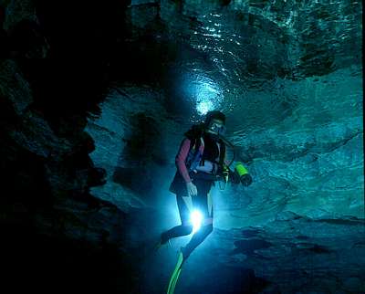 Entering the crystal-clear water