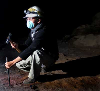 Juan Cristancho measuring silt depth. Photo by Sigurjon Jonsson