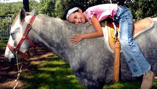 Andrea Herrera con Lagarto