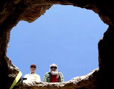 skyward view from sinkhole 2 on top of Shiprock, with Eric Richter and Marek looking on